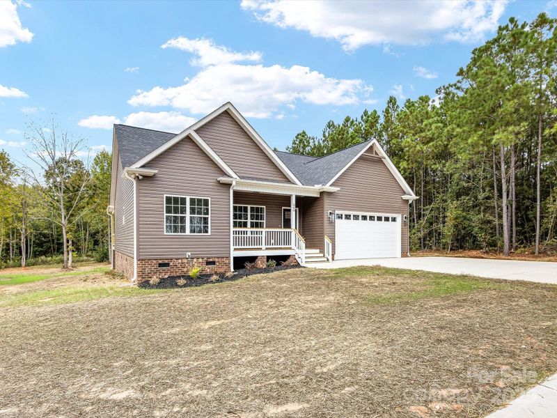 Front exterior of a new home in , York, SC, highlighting curb appeal (Image 2). Front exterior of a new home in , York, SC, highlighting curb appeal (Image 2).