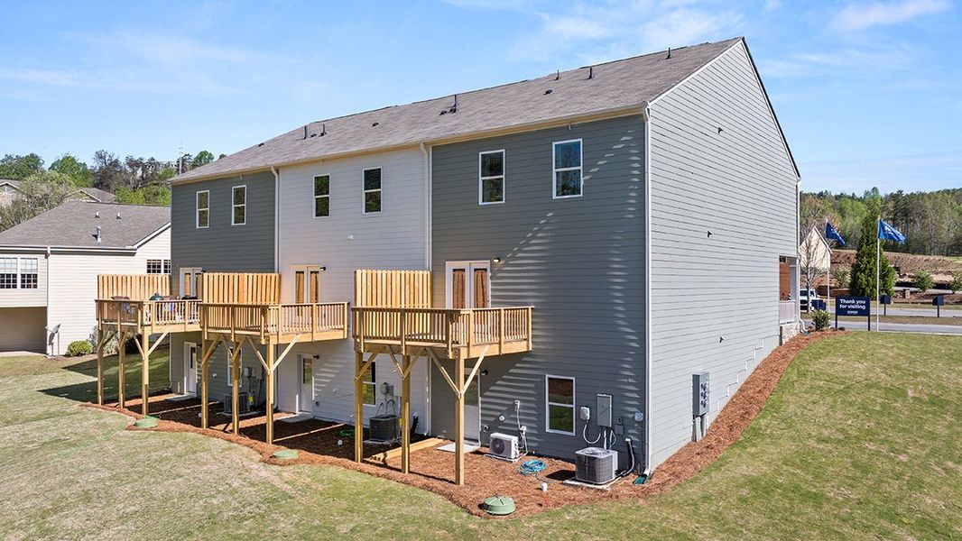 Representative exterior photo of a completed home built from the SUDBURY 24' TOWNHOME by D.R. Horton in Mountain Park, Dahlonega, GA (Image 19). Representative exterior photo of a completed home built from the SUDBURY 24' TOWNHOME by D.R. Horton in Mountain Park, Dahlonega, GA (Image 19).