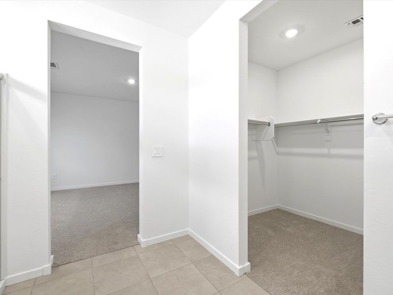 Spacious, unfurnished interior of a new home in Bella Vista Farms Estate Series, San Tan Valley (Image 10).