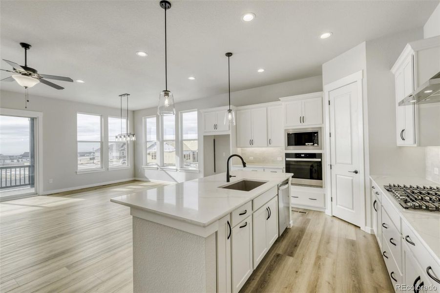 Furnished interior view inside a new home in Sterling Ranch Homestead, Colorado Springs (Image 6).