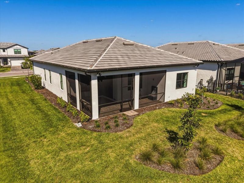 Exterior details and patio area of a home in Talon Preserve on Palmer Ranch, Nokomis (Image 36).