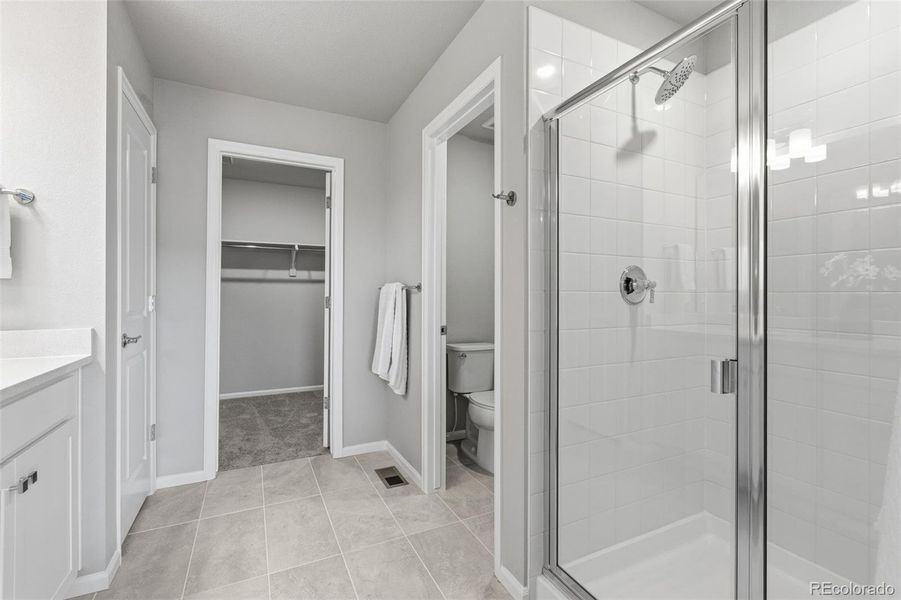 Furnished interior view inside a new home in Woodrose at Painted Prairie, Aurora (Image 24).