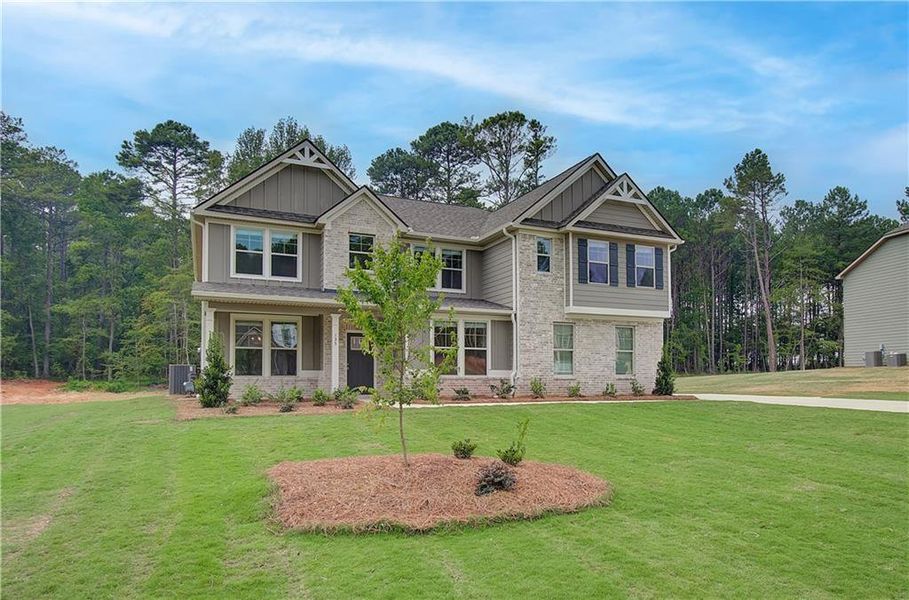 Front exterior of a new home in Riverbend Overlook, Fayetteville, GA, highlighting curb appeal (Image 13).