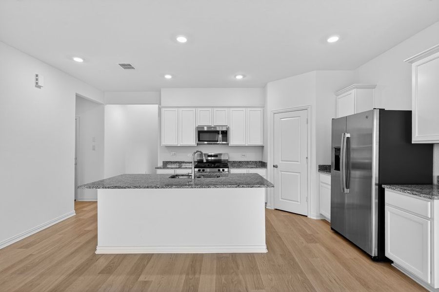 Furnished interior view inside a new home in River Ridge, Crandall (Image 4).