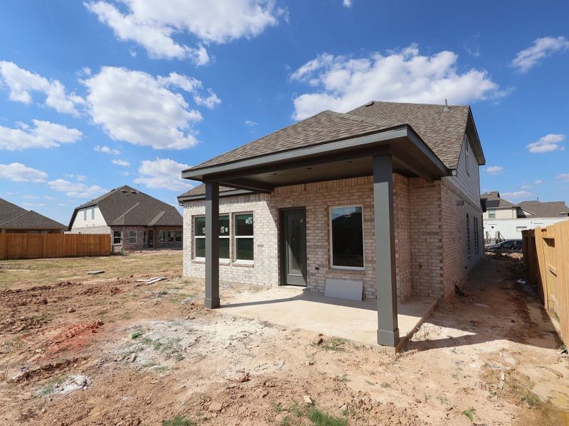 Exterior details and patio area of a home in Marvida, Cypress (Image 4).