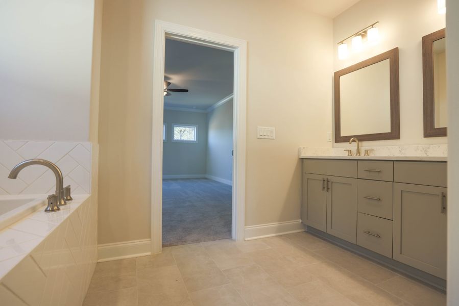 Representative furnished interior of a home built from the The Bennett by The Providence Group in Aberdeen, Hoschton (Image 18).