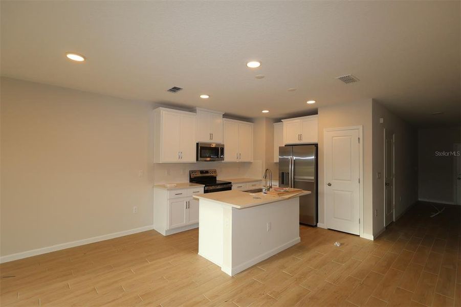 Furnished interior view inside a new home in Reeves Place, Orlando (Image 6).