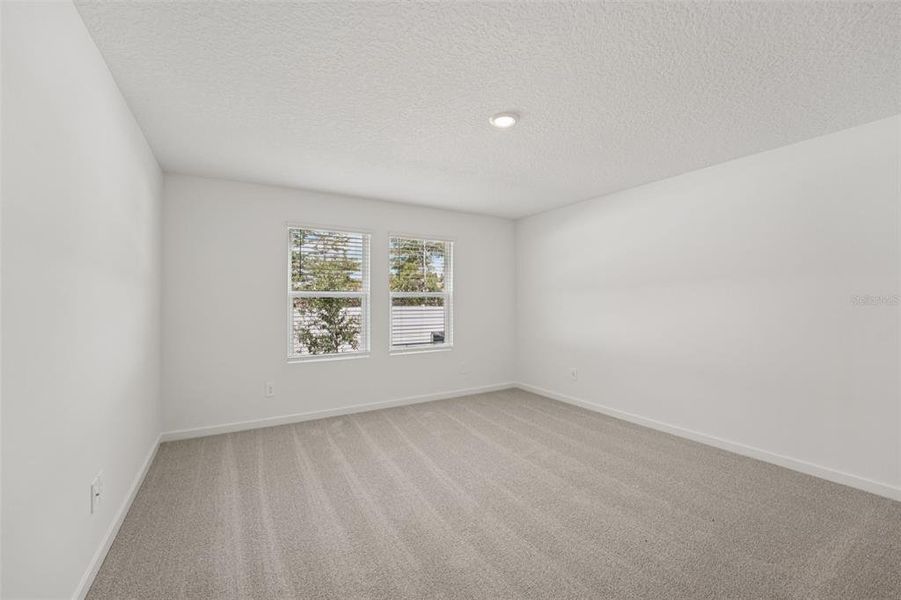 Spacious, unfurnished interior of a new home in Flagler Village - Classic Series, Palm Coast (Image 23). Spacious, unfurnished interior of a new home in Flagler Village - Classic Series, Palm Coast (Image 23).
