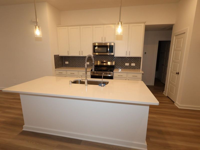 Furnished interior view inside a new home in Pinewood at Grand Texas, New Caney (Image 8).