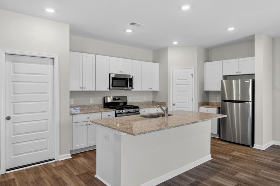 Furnished interior view inside a new home in Lindera Preserve at Cane Bay Plantation, Summerville (Image 9).