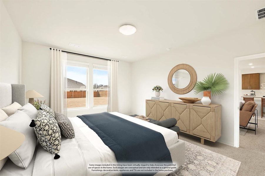 Bedroom with queen bed, wood dresser, round mirror, and window with backyard view Bedroom with queen bed, wood dresser, round mirror, and window with backyard view