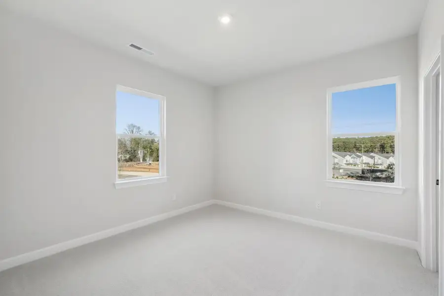 Spacious, unfurnished interior of a new home in Summit At Homestead, Chapel Hill (Image 12).