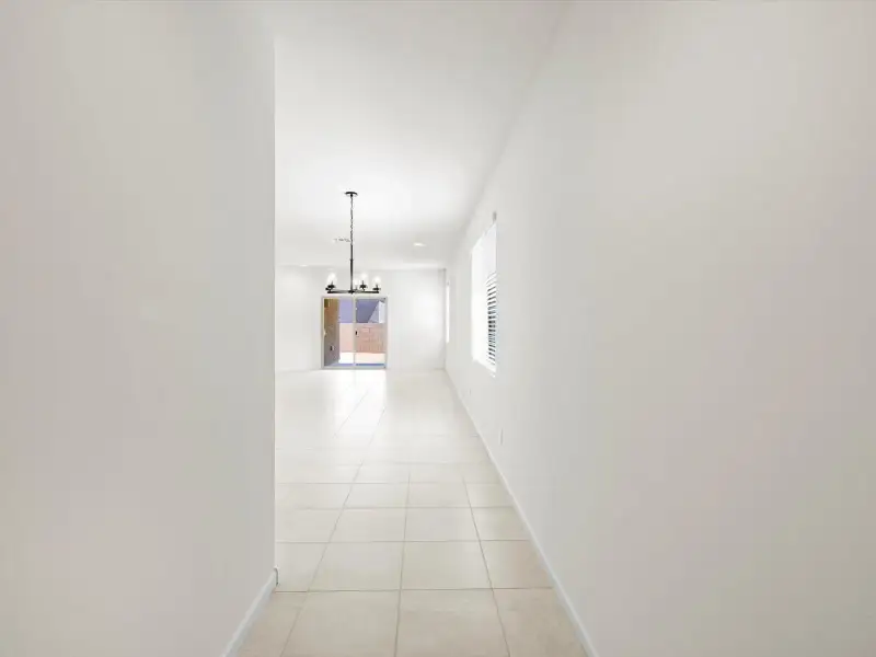 Spacious, unfurnished interior of a new home in Mandarina - Signature Series, Marana (Image 8).