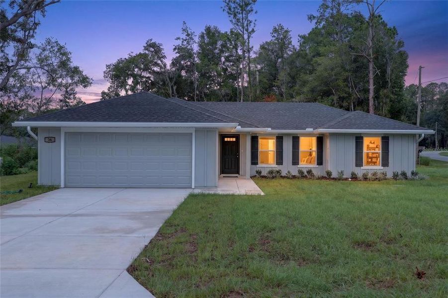 Front exterior of a new home in , Ocala, FL, highlighting curb appeal (Image 1). Front exterior of a new home in , Ocala, FL, highlighting curb appeal (Image 1).