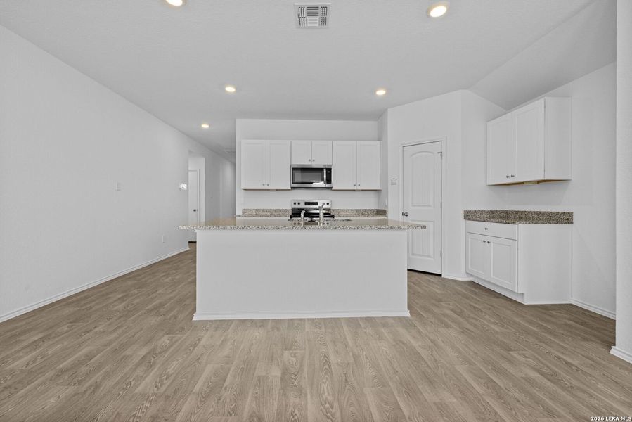 Furnished interior view inside a new home in Arroyo Ranch, Seguin (Image 5).