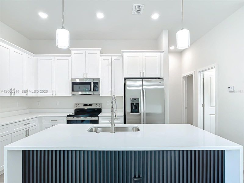 Furnished interior view inside a new home in , Port Charlotte (Image 6).