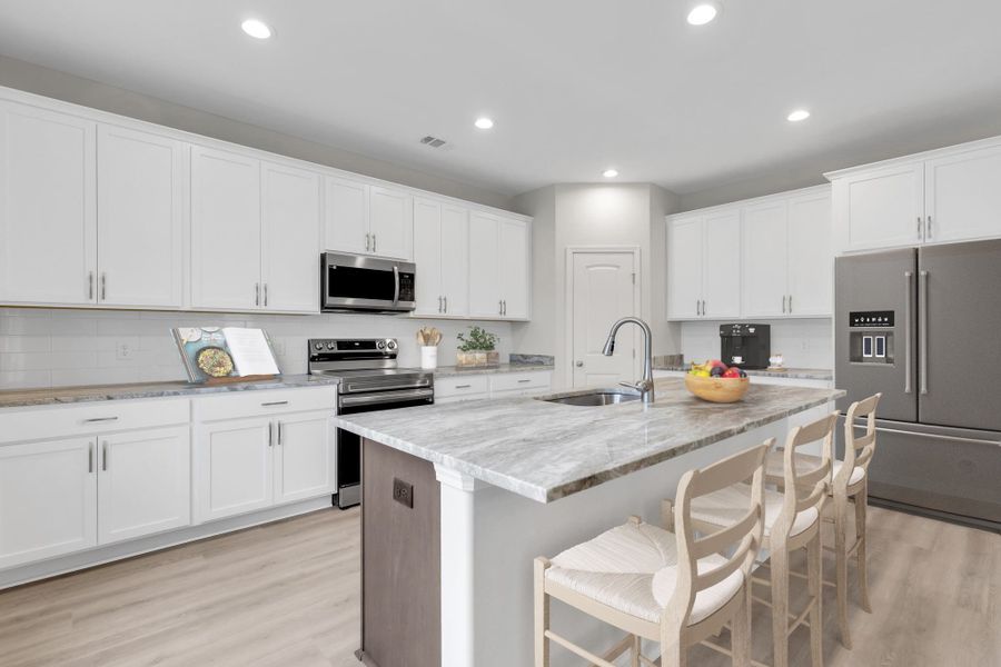 Representative furnished interior of a home built from the The Brookhaven by Smith Family Homes in Ramsey Landing, Rincon (Image 8).