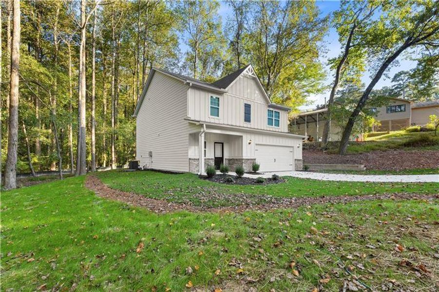 Front exterior of a new home in , Buford, GA, highlighting curb appeal (Image 2).