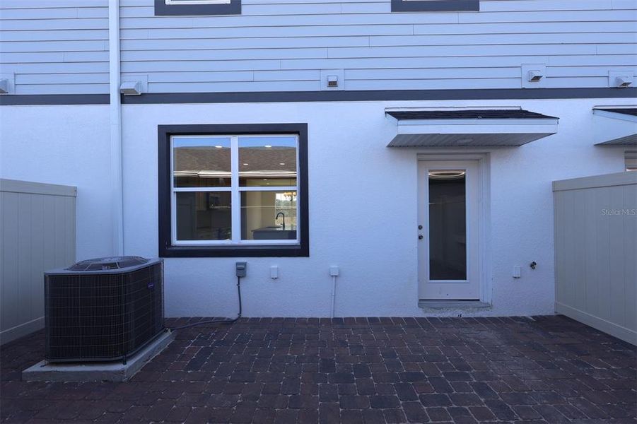 Exterior details and patio area of a home in Center Lake on the Park, St. Cloud (Image 3).