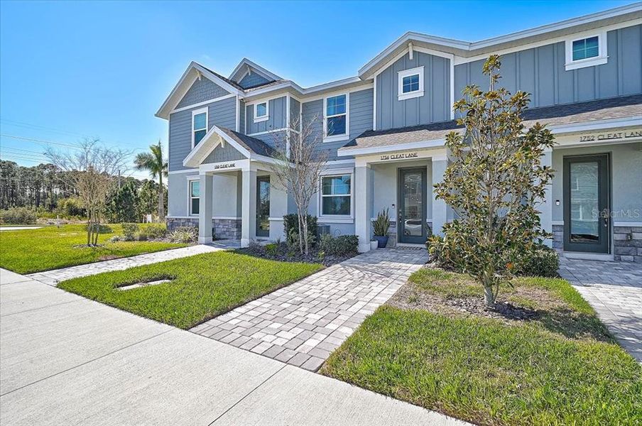 Front exterior of a new home in , Sarasota, FL, highlighting curb appeal (Image 22).