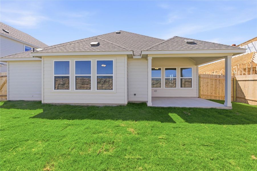 Exterior details and patio area of a home in Hunters Glen, Jarrell (Image 17).