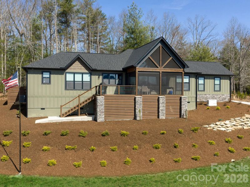 Front exterior of a new home in , Hendersonville, NC, highlighting curb appeal (Image 23).