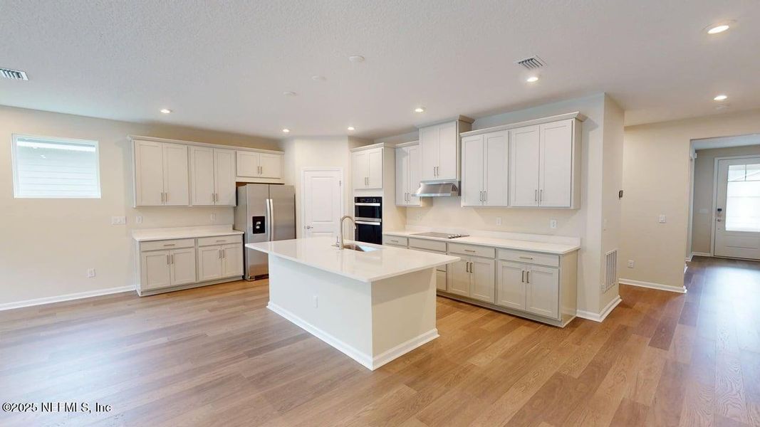 Furnished interior view inside a new home in Lakes at Bella Lago, Green Cove Springs (Image 4).