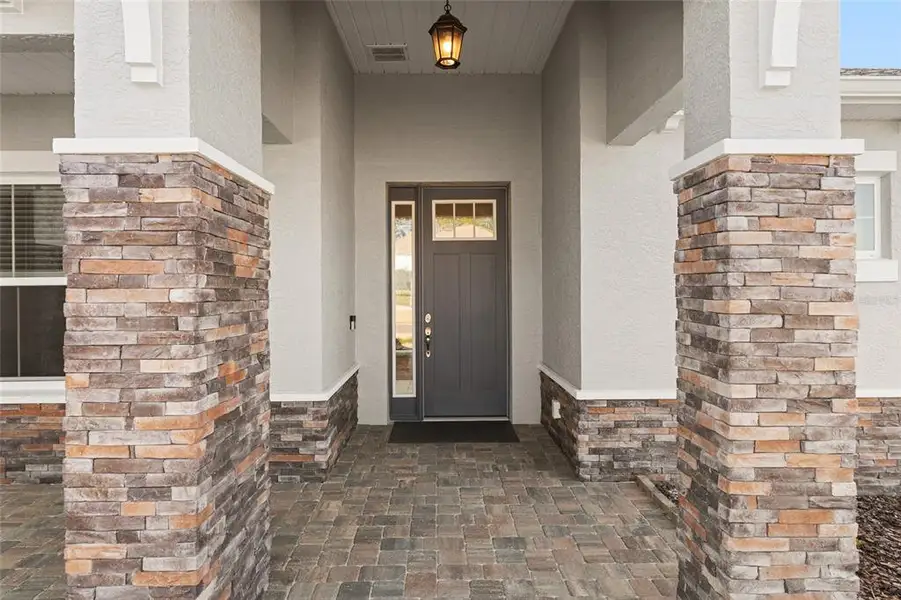 Exterior details and patio area of a home in , Ocala (Image 3).