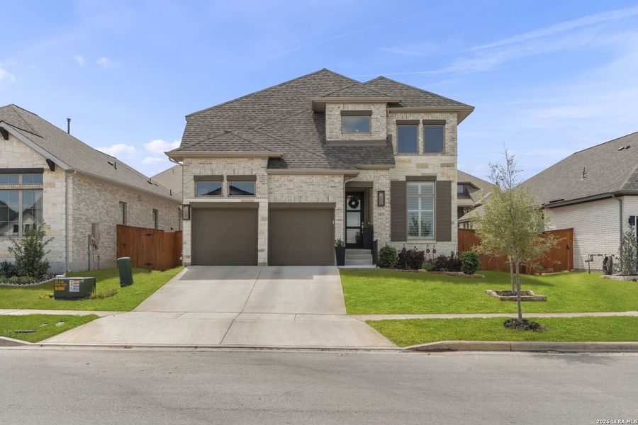 Front exterior of a new home in Veramendi, New Braunfels, TX, highlighting curb appeal (Image 23).