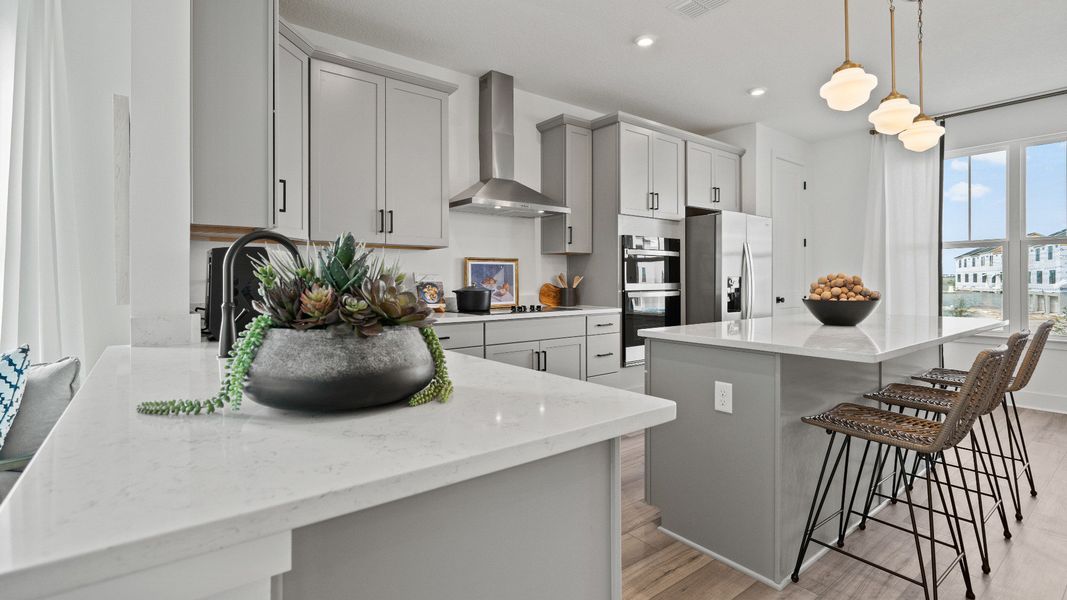 Furnished interior view inside a new home in Parkview at Hamlin, Winter Garden (Image 23).