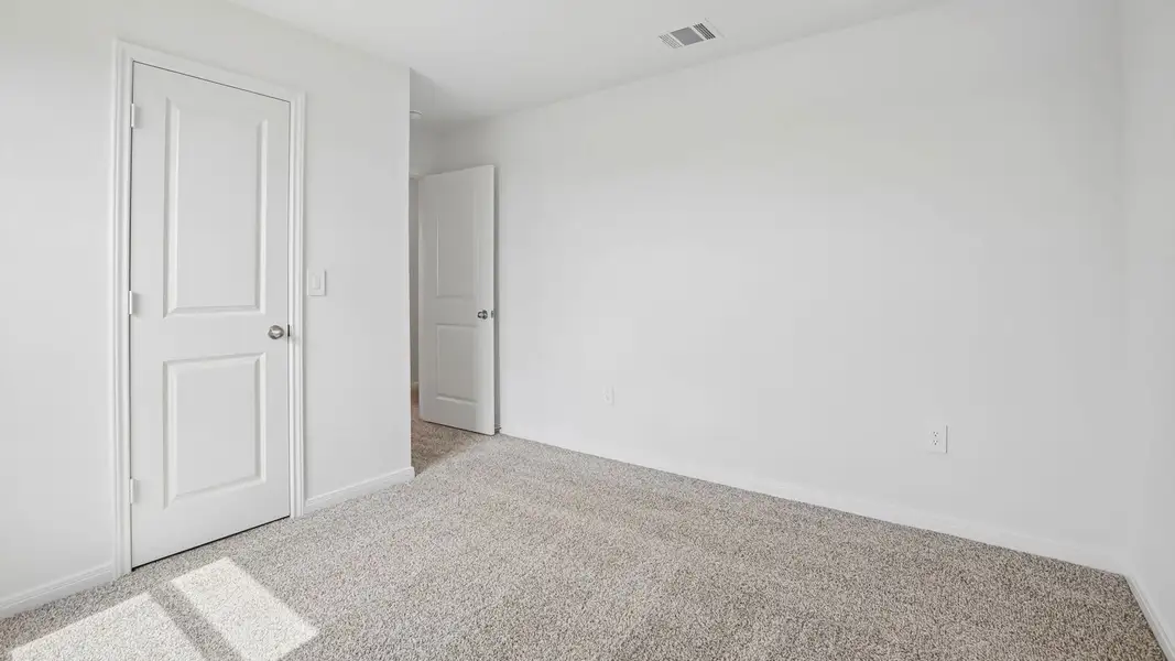 Spacious, unfurnished interior of a new home in Prairie Lakes, Buda (Image 43).