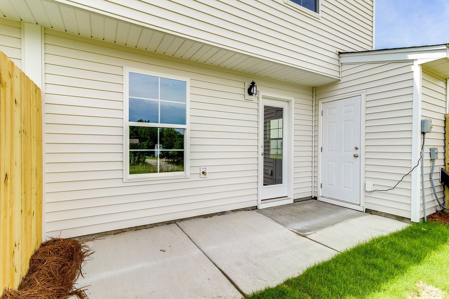 Exterior details and patio area of a home in Padgett Commons, Hopkins (Image 3).