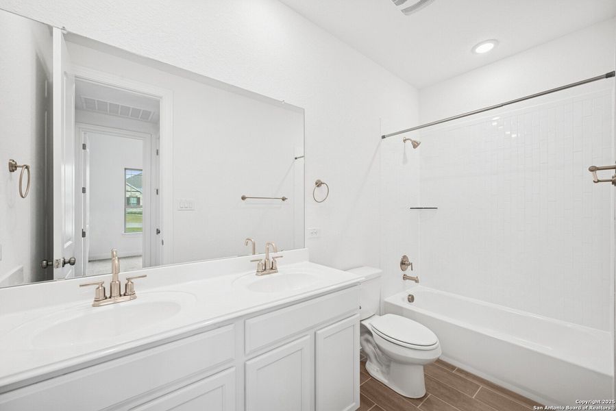 Furnished interior view inside a new home in Everly Estates, San Antonio (Image 8).