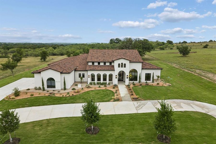 Front exterior of a new home in , Weatherford, TX, highlighting curb appeal (Image 2). Front exterior of a new home in , Weatherford, TX, highlighting curb appeal (Image 2).