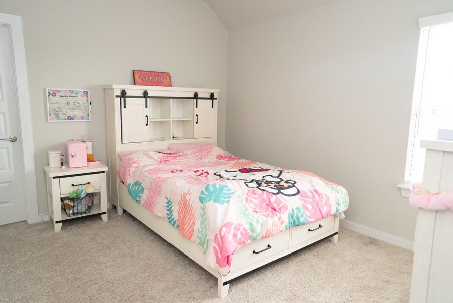 Furnished interior view inside a new home in Sunterra, Katy (Image 16).