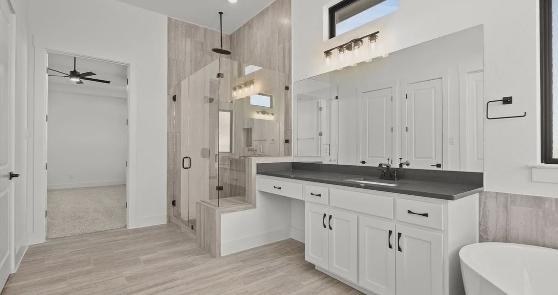 Representative furnished interior of a home built from the Allison by Chesmar Homes in Sweetwater, Austin (Image 10).