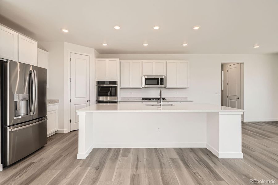 Furnished interior view inside a new home in Macanta: The Grand Collection, Castle Rock (Image 7).
