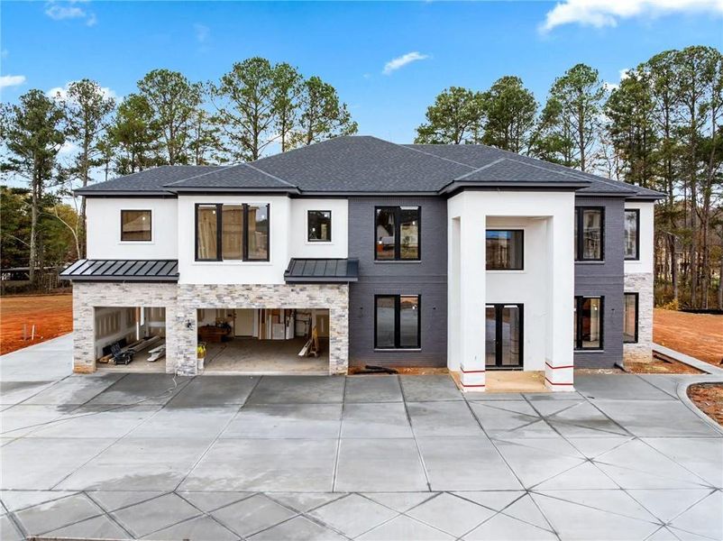 Front exterior of a new home in , Buford, GA, highlighting curb appeal (Image 2).