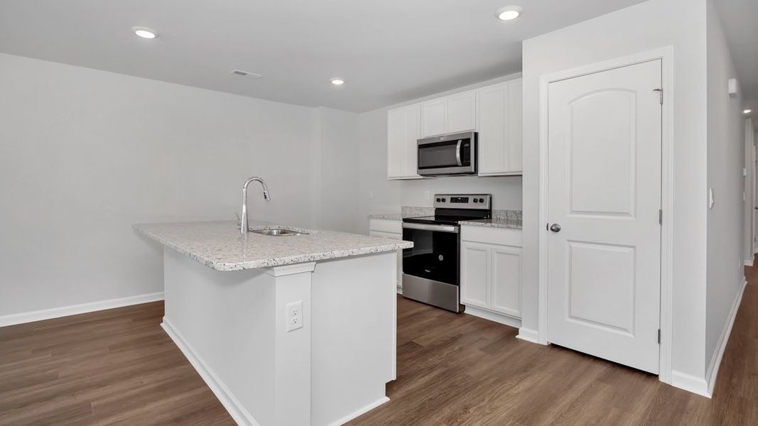 Representative furnished interior of a home built from the Freeport by D.R. Horton in Bailey Park, Fayetteville (Image 5). Representative furnished interior of a home built from the Freeport by D.R. Horton in Bailey Park, Fayetteville (Image 5).