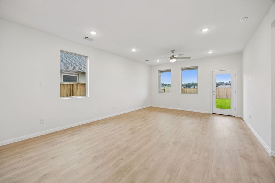 Dining and Living Areas in the Magnolia home plan by Trophy Signature Homes – REPRESENTATIVE PHOTO