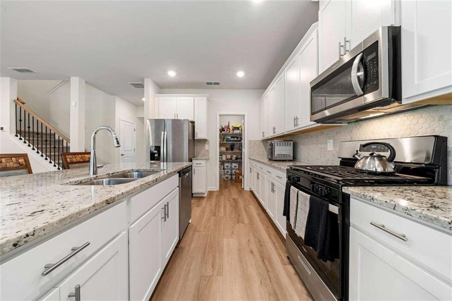 Furnished interior view inside a new home in Creekside at Oxford Park, Fairburn (Image 3).