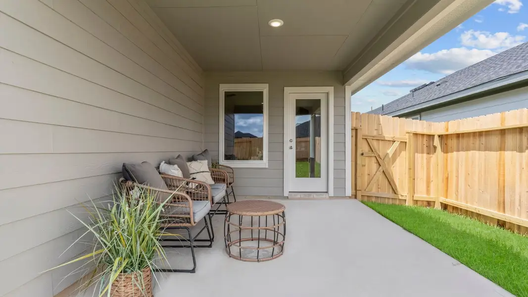 Exterior details and patio area of a home in Emberly, Beasley (Image 2).
