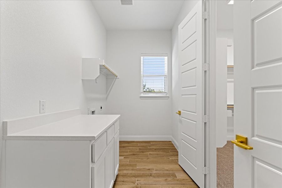 Representative furnished interior of a home built from the The Braden II by Doug Parr Custom Homes in Kessler Farms, Brock (Image 17).