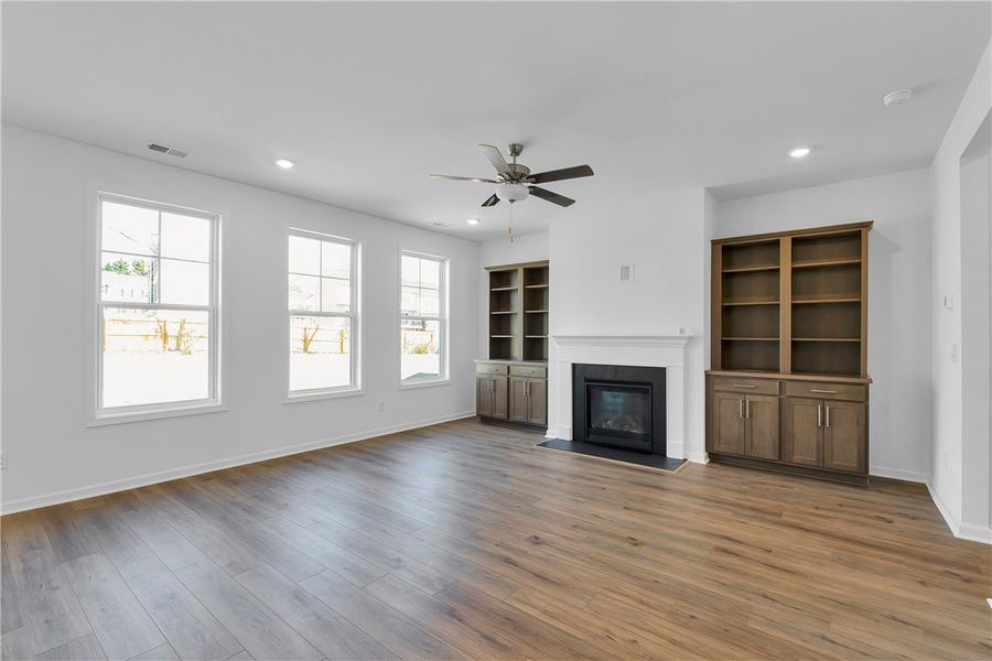 This bright living space features elegant flooring