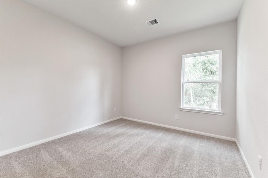 Spacious, unfurnished interior of a new home in Caney Creek Place, Conroe (Image 78).