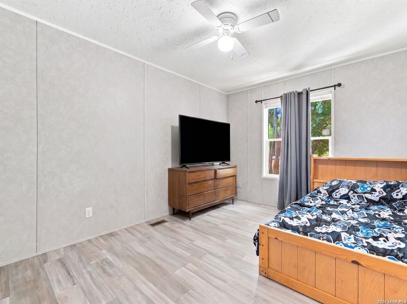 Furnished interior view inside a new home in , Devine (Image 15).