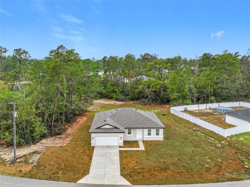 Front exterior of a new home in , Ocala, FL, highlighting curb appeal (Image 26). Front exterior of a new home in , Ocala, FL, highlighting curb appeal (Image 26).