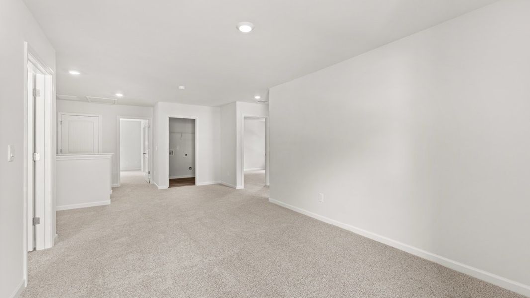 Representative unfurnished interior of a home built from the Hanover by D.R. Horton in Northwoods at Mirror Lake, Villa Rica (Image 33).