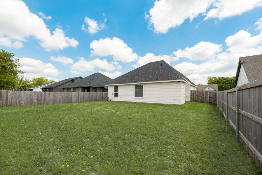 Exterior details and patio area of a home in , Tom Bean (Image 24).