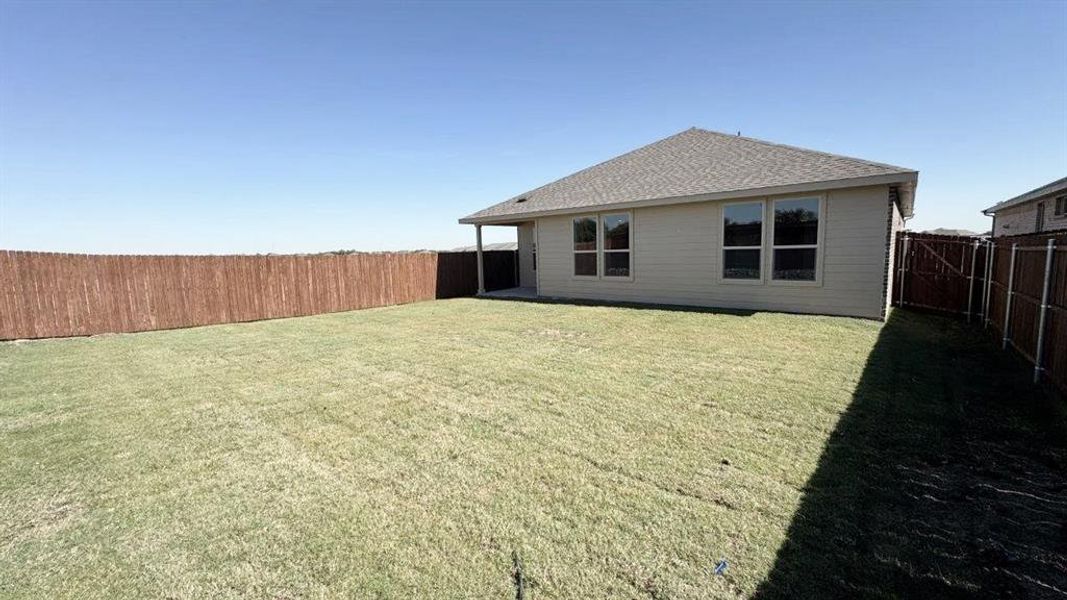 Exterior details and patio area of a home in Monarch at the Meadows, Ponder (Image 3).